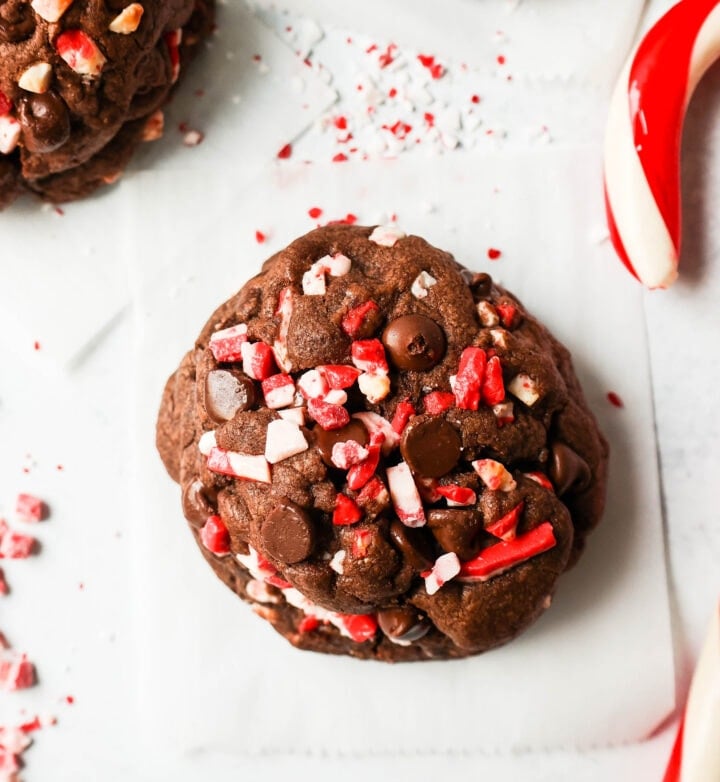 Thick, soft, chewy bakery-style chocolate peppermint cookie recipe. This Levain Bakery Chocolate Peppermint Cookie is made with a rich double chocolate cookie and peppermint chips. The perfect Christmas cookie recipe!