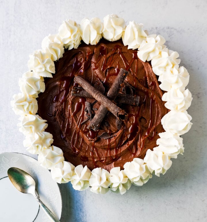 Mexican Chocolate Cream Pie is made with a graham cracker and almond crust filled with Mexican chocolate cream filling and topped with fresh whipped cream. This Mexican Chocolate Pie recipe is from the famous Elote Cafe in Sedona Arizona.