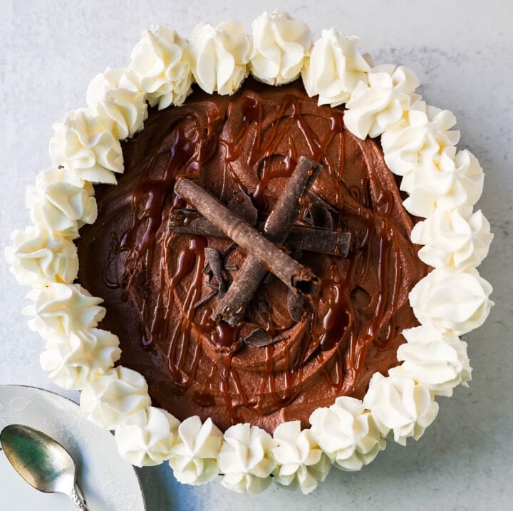 Mexican Chocolate Cream Pie is made with a graham cracker and almond crust filled with Mexican chocolate cream filling and topped with fresh whipped cream. This Mexican Chocolate Pie recipe is from the famous Elote Cafe in Sedona Arizona.