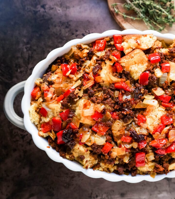 Mexican Chorizo Cornbread Stuffing made with cornbread tossed with sauteed peppers and onions, Mexican chorizo, chipotle peppers, chicken broth, cream, and spices. The most flavorful stuffing you will ever try!