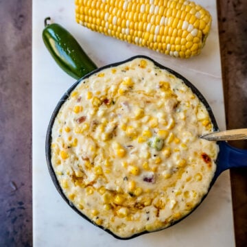 This Southwest Creamed Corn is made with white corn, sauteed with jalapenos and onions, and cooked with heavy cream and pepper jack cheese. The perfect creamed corn recipe with so much flavor!