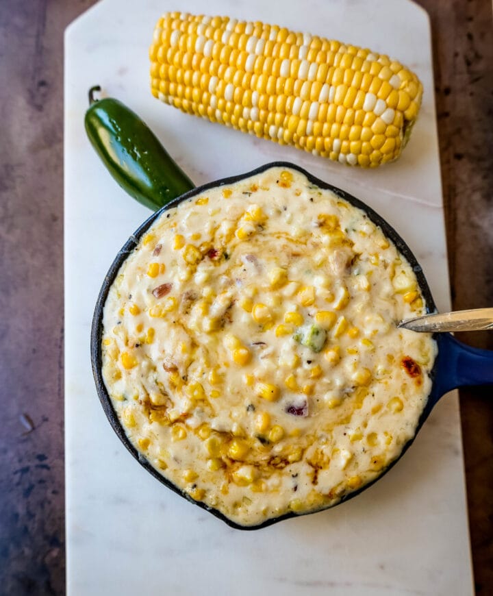 This Southwest Creamed Corn is made with white corn, sauteed with jalapenos and onions, and cooked with heavy cream and pepper jack cheese. The perfect creamed corn recipe with so much flavor!