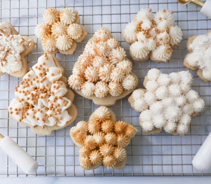 Soft, chewy homemade Christmas Sugar cookies with buttercream frosting. This is the best cut out sugar cookie recipe!