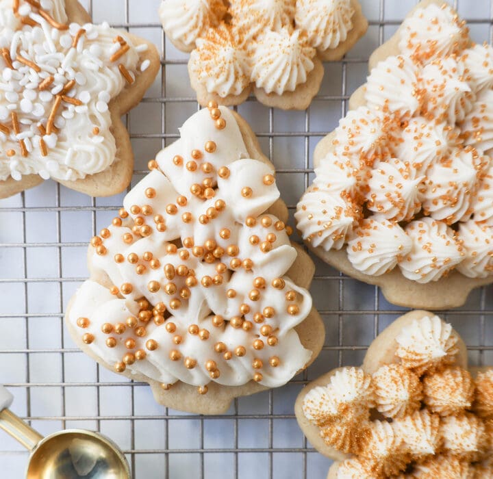 Soft, chewy homemade Christmas Sugar cookies with buttercream frosting. This is the best cut out sugar cookie recipe!