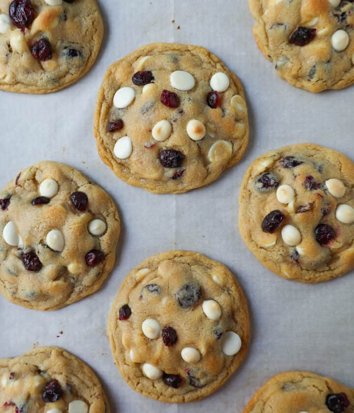 Soft Cranberry White Chocolate Chip Cookies are perfectly chewy with buttery crispy edges filled with sweet dried cranberries and creamy white chocolate chip chips. The Best White Chocolate Chip Cookie Recipe!