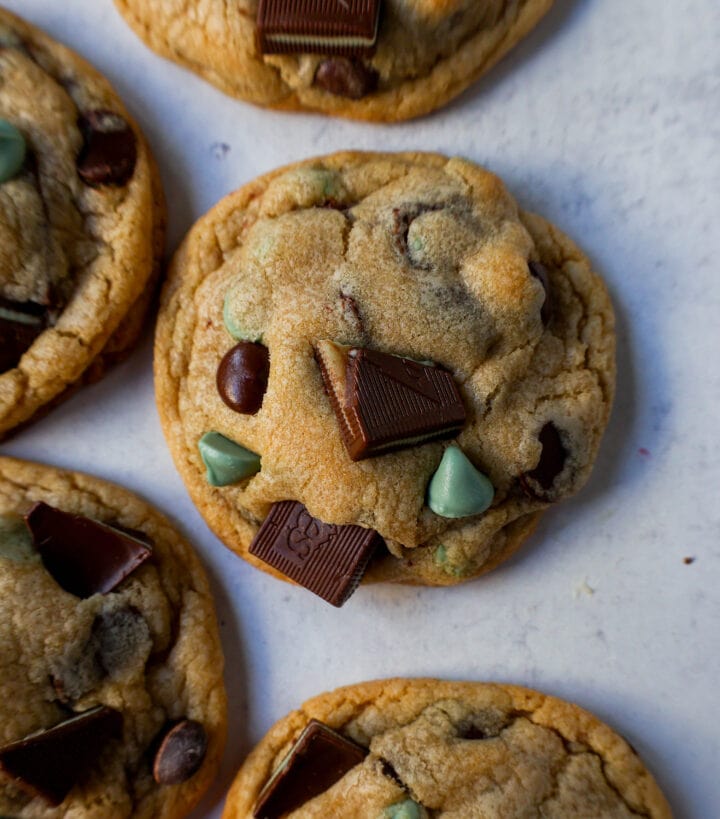 Soft, Chewy Mint Chocolate Chip Cookies are a classic chocolate chip cookie filled with mint chips, semi-sweet chocolate chips, and Andes chocolate mint chocolates. This is the best mint chocolate chip cookie recipe!