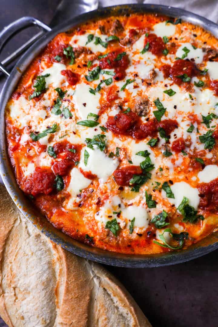 Quick, easy Skillet Lasagna made in 35 minutes is filled with bolognese meat sauce, ricotta parmesan cheese filling, mozzarella cheese, and fresh herbs. This is the best skillet lasagna recipe!