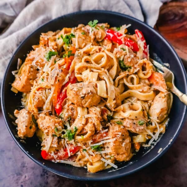 Creamy Cajun Chicken Pasta is the perfect cajun chicken alfredo dish made with tender chicken tossed in cajun seasoning in a rich, creamy alfredo sauce. The perfect spicy chicken pasta!