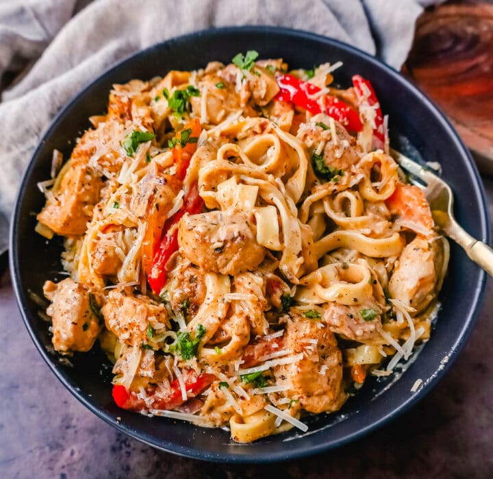 Creamy Cajun Chicken Pasta is the perfect cajun chicken alfredo dish made with tender chicken tossed in cajun seasoning in a rich, creamy alfredo sauce. The perfect spicy chicken pasta!