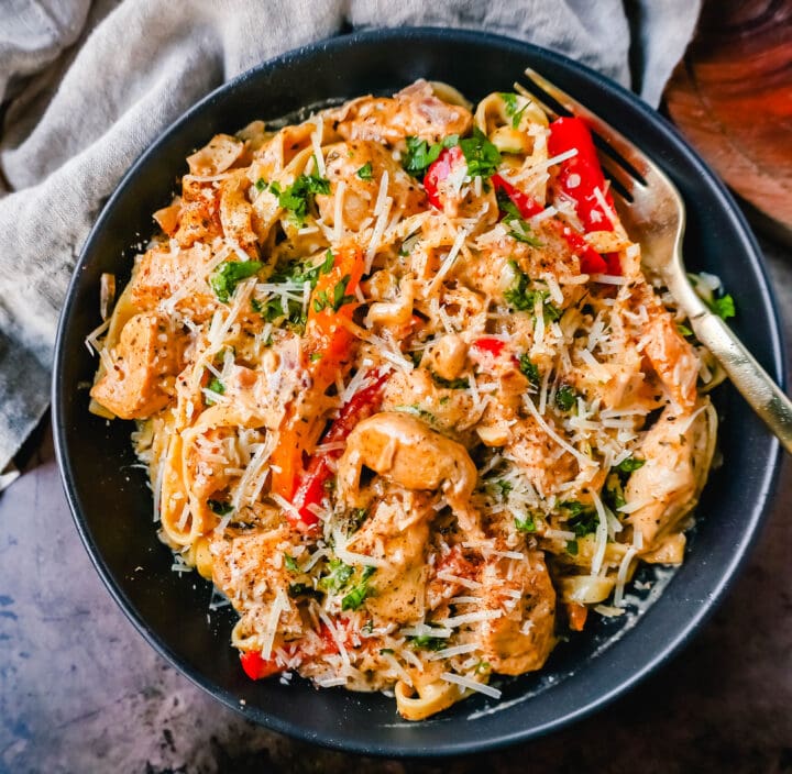 Creamy Cajun Chicken Pasta is the perfect cajun chicken alfredo dish made with tender chicken tossed in cajun seasoning in a rich, creamy alfredo sauce. The perfect spicy chicken pasta!