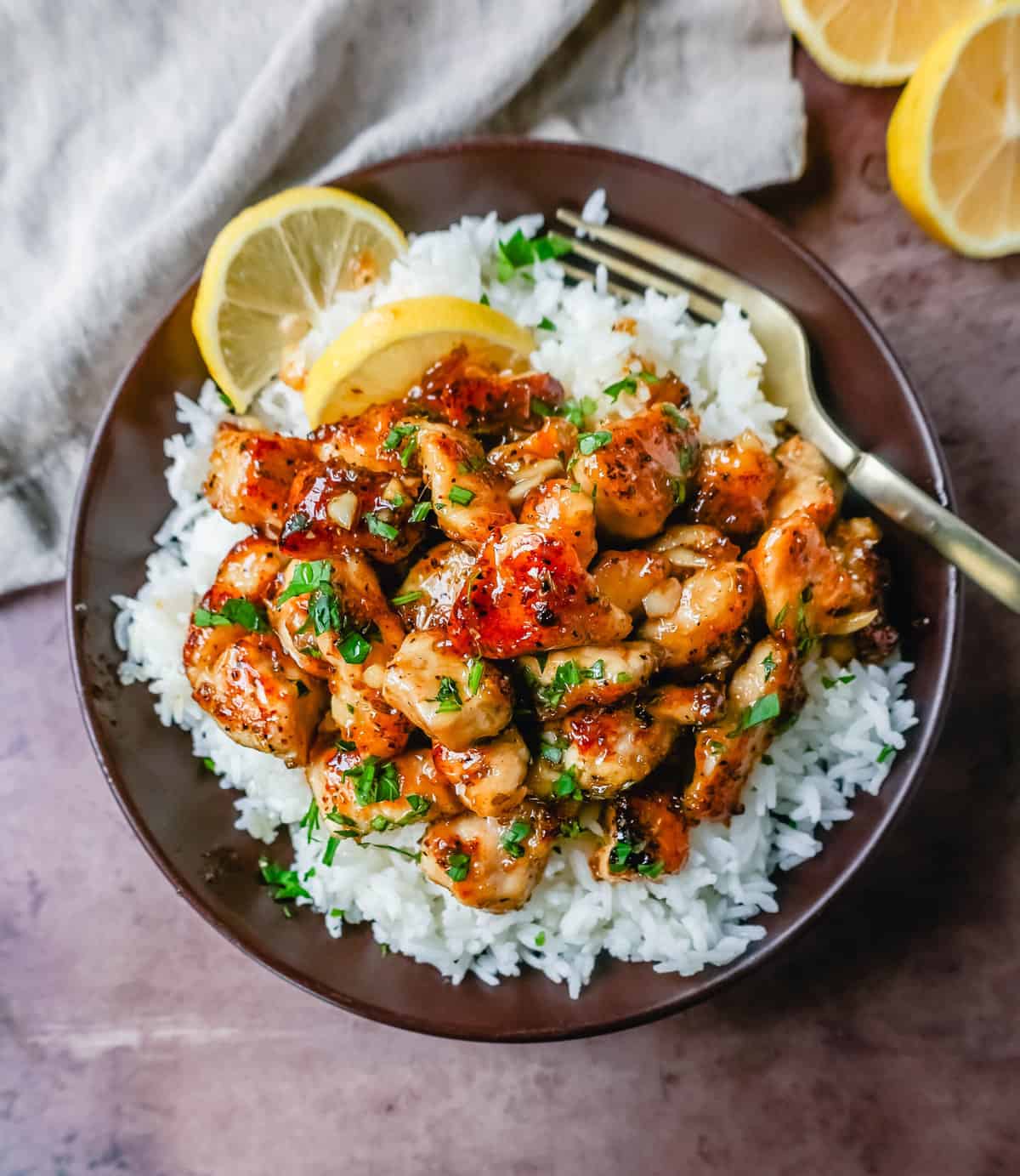 This Honey Chicken is tender chicken tossed in a skillet with butter, honey, garlic, fresh lemon juice, spices, and soy sauce. This Honey Lemon Chicken is a quick and easy 15-minute chicken dish.