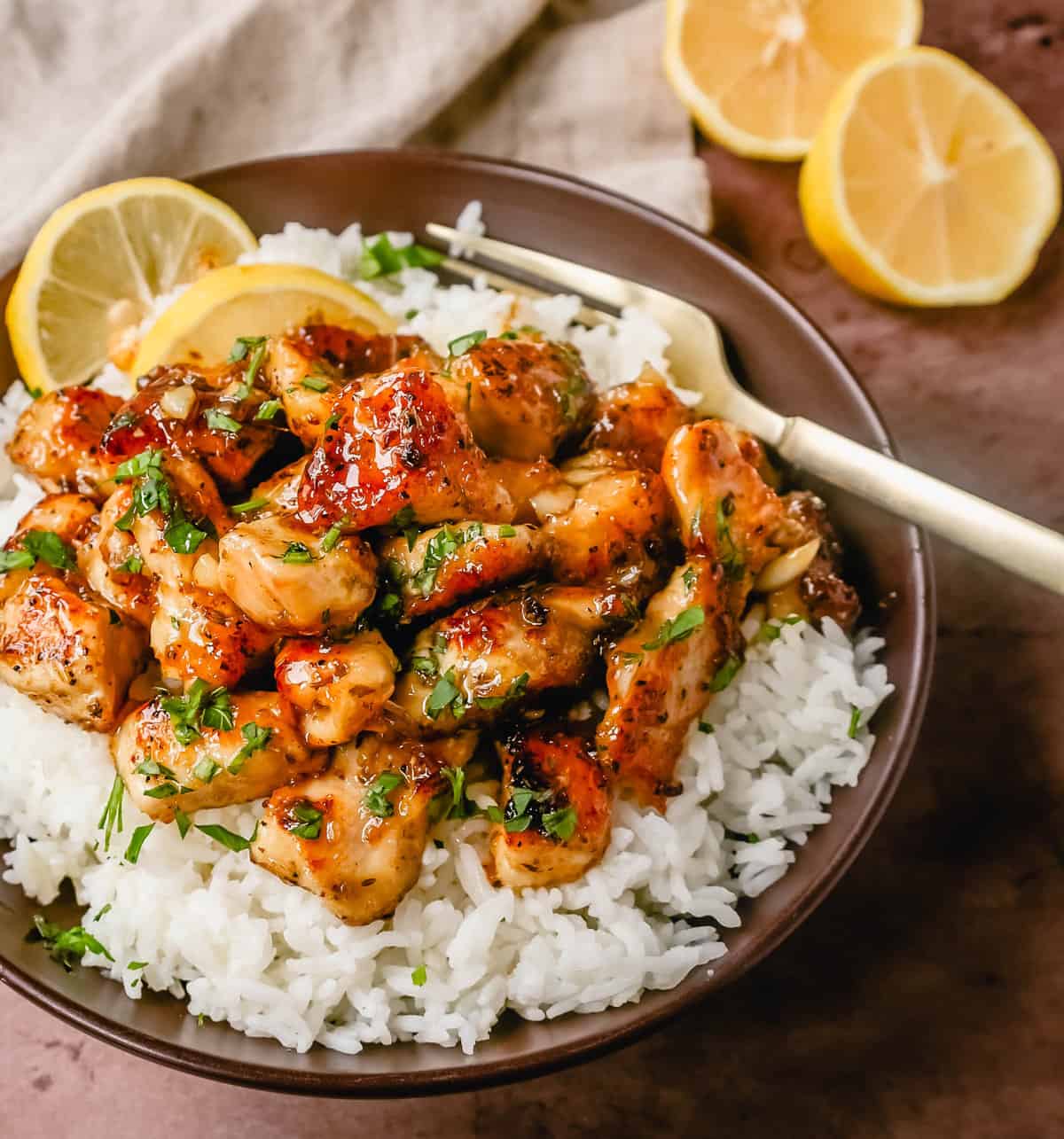 This Honey Chicken is tender chicken tossed in a skillet with butter, honey, garlic, fresh lemon juice, spices, and soy sauce. This Honey Lemon Chicken is a quick and easy 15-minute chicken dish.