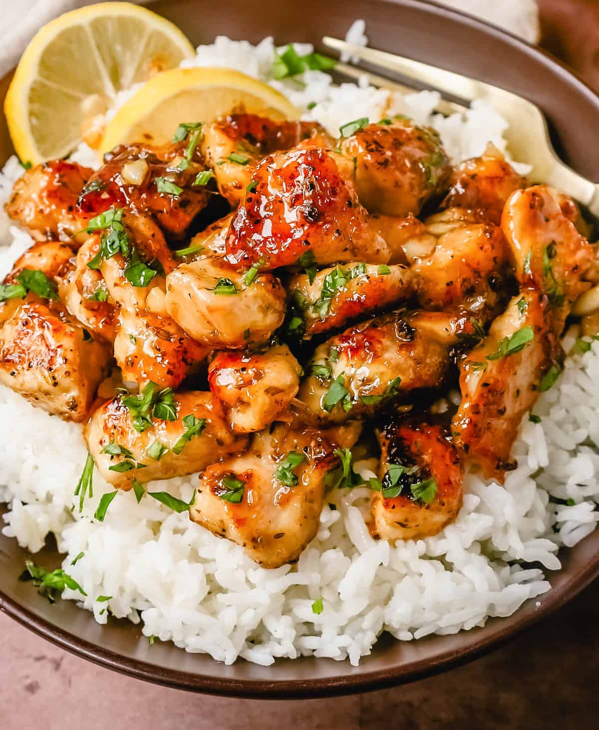 This Honey Chicken is tender chicken tossed in a skillet with butter, honey, garlic, fresh lemon juice, spices, and soy sauce. This Honey Lemon Chicken is a quick and easy 15-minute chicken dish.