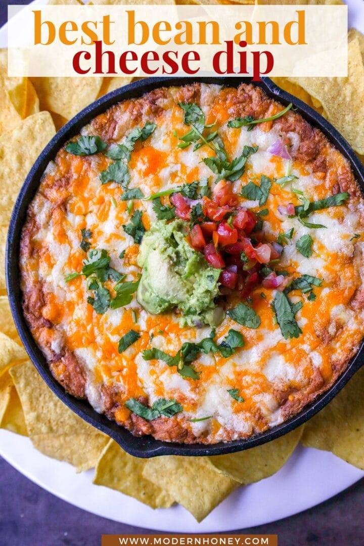 This is the best bean dip recipe ever! This is such an easy bean and cheese dip made with creamy beans, sour cream, cream cheese, taco seasoning, hot sauce, and lots of Mexican cheese! This easy bean dip is the best appetizer recipe. 