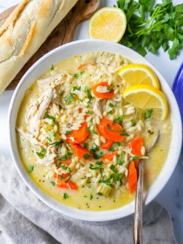 This is the best Lemon Chicken Orzo Soup recipe! This Chicken Orzo Soup is made with tender chicken with onions, carrots, celery, and garlic in a fresh lemon cream broth with fresh parmesan cheese. You will love this lemon chicken soup recipe!