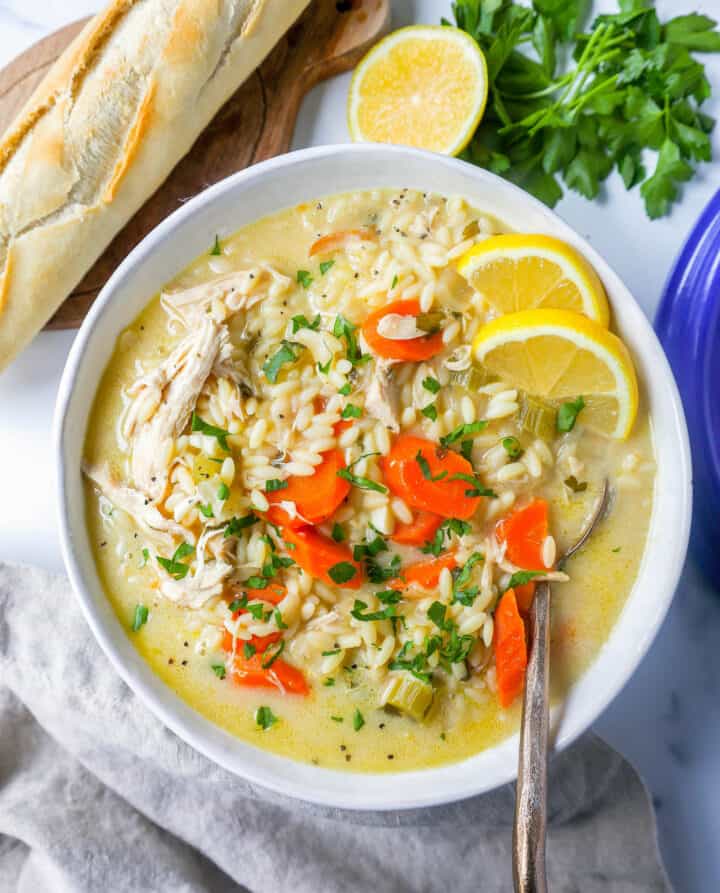 This is the best Lemon Chicken Orzo Soup recipe! This Chicken Orzo Soup is made with tender chicken with onions, carrots, celery, and garlic in a fresh lemon cream broth with fresh parmesan cheese. You will love this lemon chicken soup recipe!