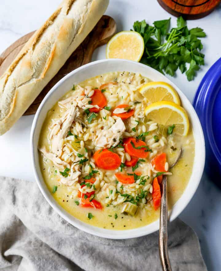 This is the best Lemon Chicken Orzo Soup recipe! This Chicken Orzo Soup is made with tender chicken with onions, carrots, celery, and garlic in a fresh lemon cream broth with fresh parmesan cheese. You will love this lemon chicken soup recipe!