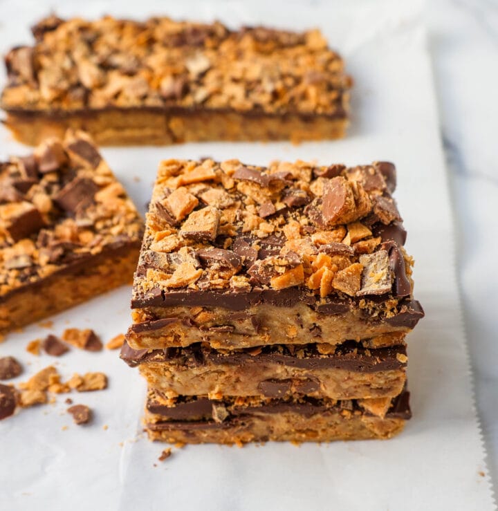 These Crunchy Butterfinger Bars are made with graham crackers, sweetened condensed milk, melted butter, Butterfinger candy bars, and topped with milk chocolate. These are the perfect creamy and crunchy peanut butter chocolate Butterfinger bars!