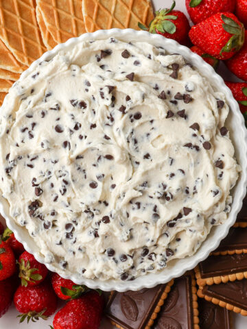 This is the Best Cannoli Dip Recipe made with ricotta cheese, mascarpone or cream cheese, powdered sugar, brown sugar, vanilla, and mini chocolate chips. 