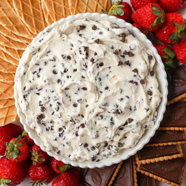 This is the Best Cannoli Dip Recipe made with ricotta cheese, mascarpone or cream cheese, powdered sugar, brown sugar, vanilla, and mini chocolate chips. 