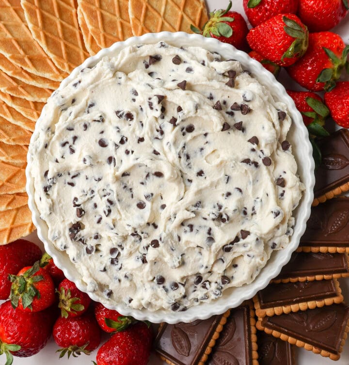 This is the Best Cannoli Dip Recipe made with ricotta cheese, mascarpone or cream cheese, powdered sugar, brown sugar, vanilla, and mini chocolate chips. 