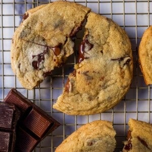 The famous Dominique Ansel Chocolate Chunk Cookie Recipe. How to make Dominique Ansel cookies at home. These chocolate chunk cookies are soft and chewy in the center with crisp edges and are full of melted chocolate.