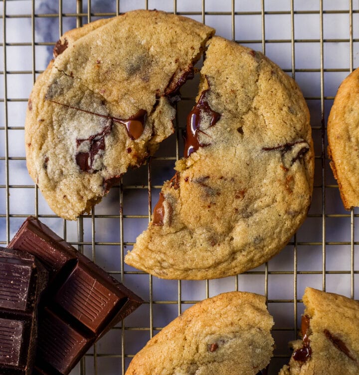 The famous Dominique Ansel Chocolate Chunk Cookie Recipe. How to make Dominique Ansel cookies at home. These chocolate chunk cookies are soft and chewy in the center with crisp edges and are full of melted chocolate.