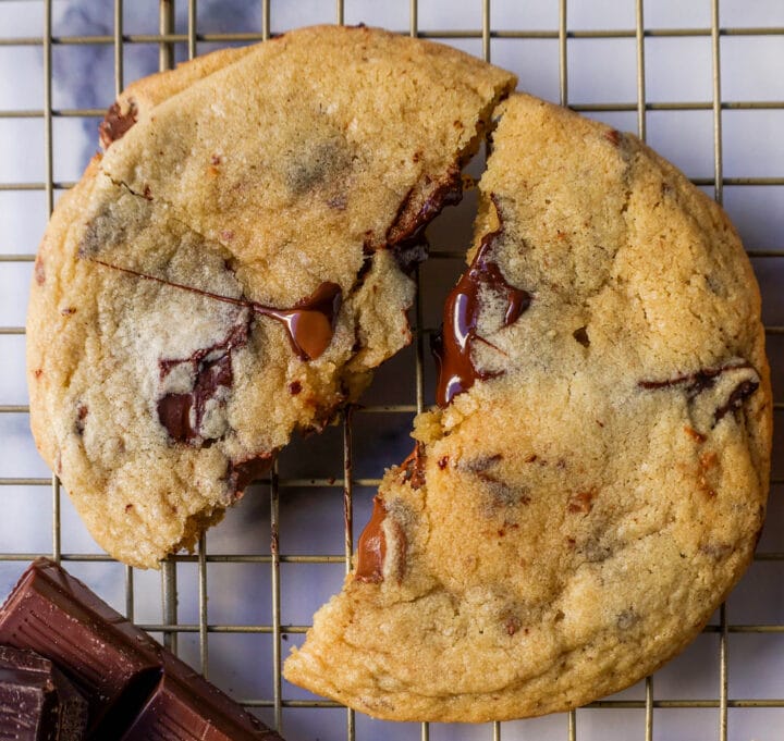 The famous Dominique Ansel Chocolate Chunk Cookie Recipe. How to make Dominique Ansel cookies at home. These chocolate chunk cookies are soft and chewy in the center with crisp edges and are full of melted chocolate.