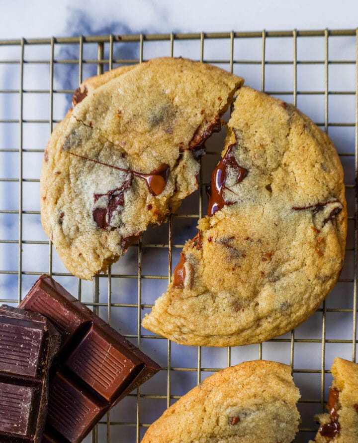 The famous Dominique Ansel Chocolate Chunk Cookie Recipe. How to make Dominique Ansel cookies at home. These chocolate chunk cookies are soft and chewy in the center with crisp edges and are full of melted chocolate.