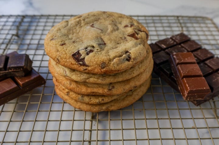 The famous Dominique Ansel Chocolate Chunk Cookie Recipe. How to make Dominique Ansel cookies at home. These chocolate chunk cookies are soft and chewy in the center with crisp edges and are full of melted chocolate.