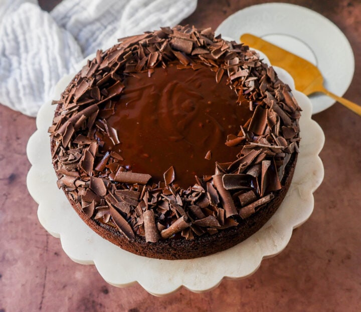 Rich decadent flourless chocolate cake recipe with chocolate ganache. This chocolate cake is a chocolate lover's dream! This naturally gluten-free chocolate cake is flour free and is so decadent!