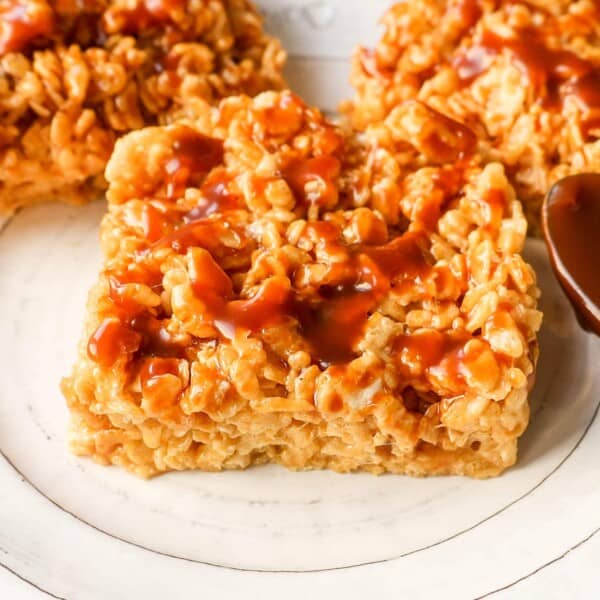 Ooey Gooey Salted Caramel Rice Krispies Treats are made with butter, marshmallows, Rice Krispies cereal, and salted caramel. This is the best caramel rice krispies treats recipe!