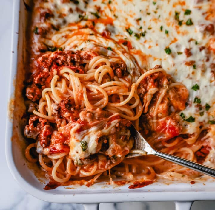 This Famous TikTok Million Dollar Spaghetti is made with a marinara meat sauce mixed with homemade alfredo sauce, tossed with spaghetti noodles, and baked with mozzarella cheese until bubbly. It is the best baked spaghetti recipe!