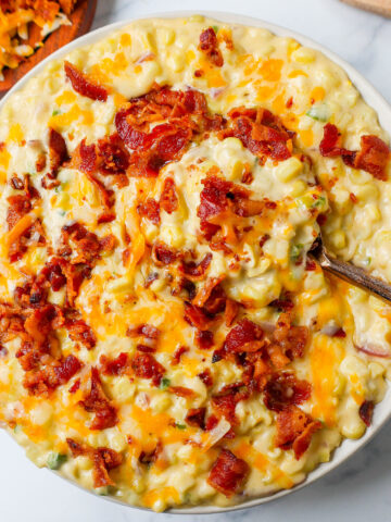 This homemade creamed corn with crispy bacon is the perfect easy side dish recipe. This is always the biggest hit at any dinner and the first vegetable side dish to be finished.