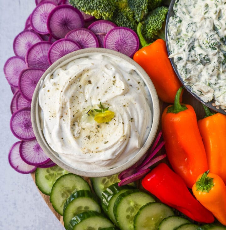 Veggie Platter with Dips. How to make a beautiful Crudite Platter with vegetables and dips. I am sharing my favorite veggie dip recipes, what vegetables to put on a veggie tray, and how to arrange one. It is so easy to make a stunning vegetable platter!