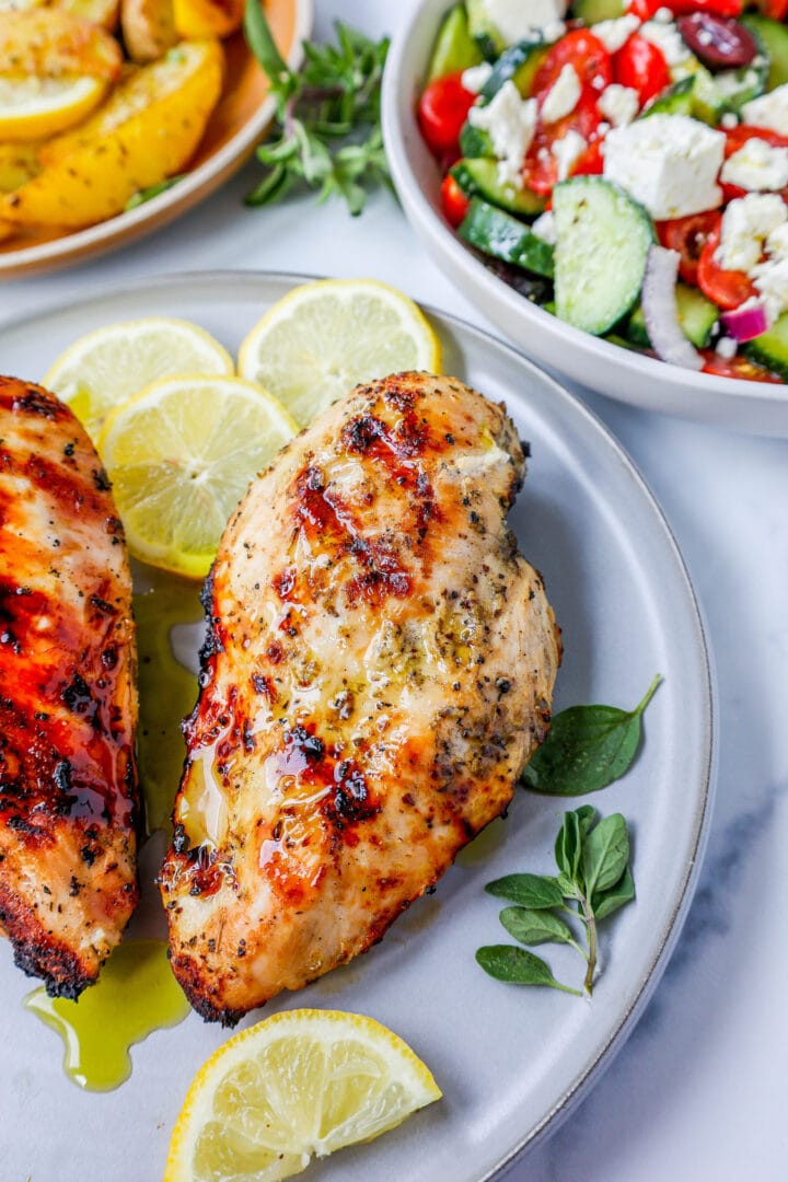 Juicy, flavorful Greek Chicken made with olive oil, lemon juice, garlic, oregano, and spices. This grilled Greek Chicken is moist and bursting with fresh flavors!