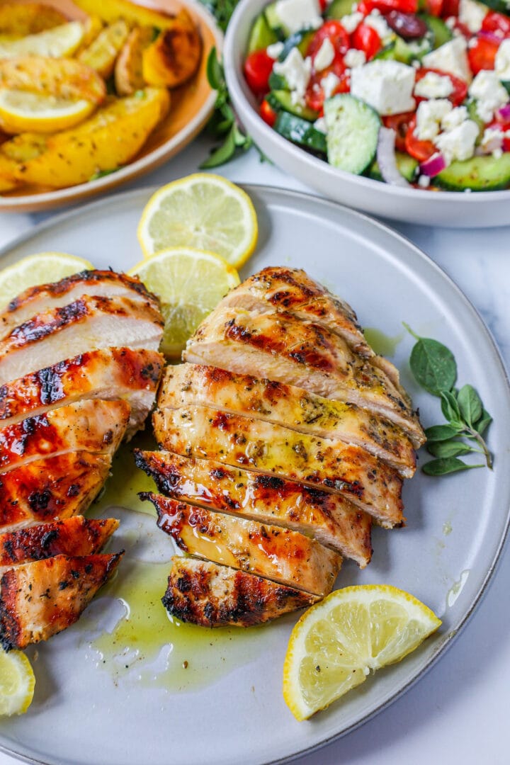 Juicy, flavorful Greek Chicken made with olive oil, lemon juice, garlic, oregano, and spices. This grilled Greek Chicken is moist and bursting with fresh flavors!