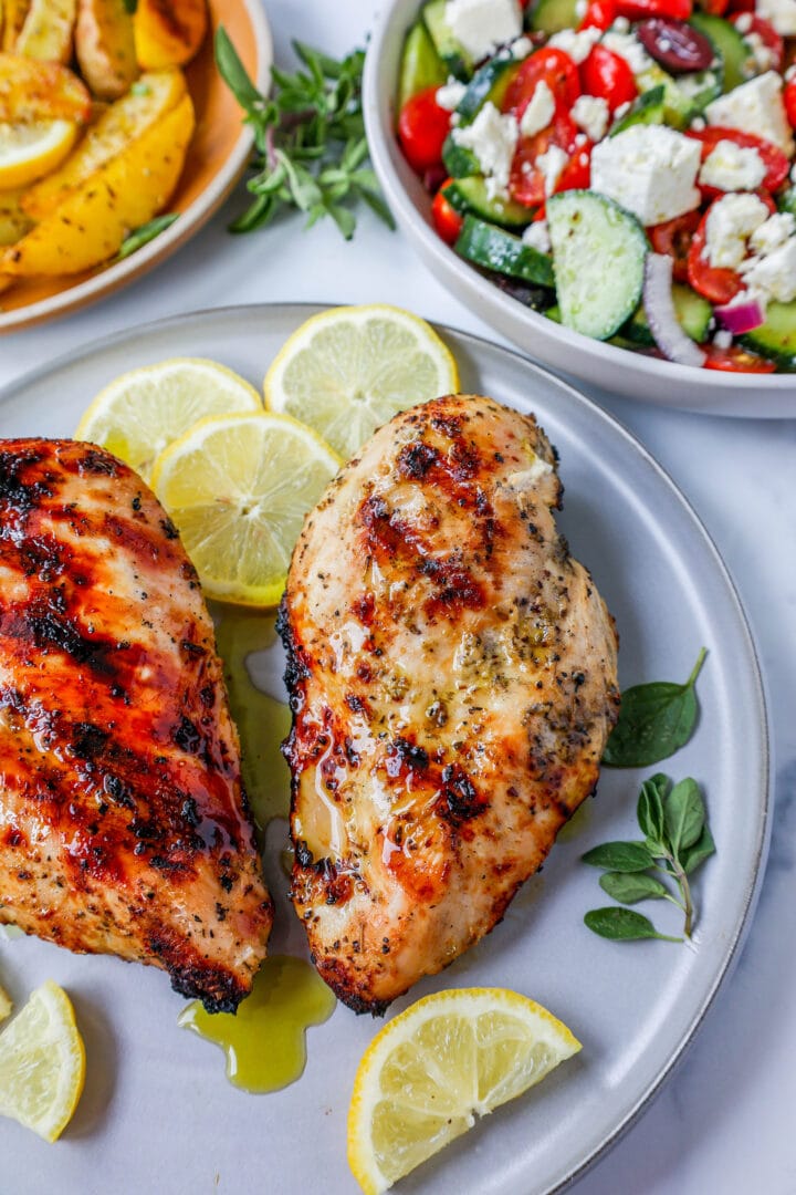 Juicy, flavorful Greek Chicken made with olive oil, lemon juice, garlic, oregano, and spices. This grilled Greek Chicken is moist and bursting with fresh flavors!