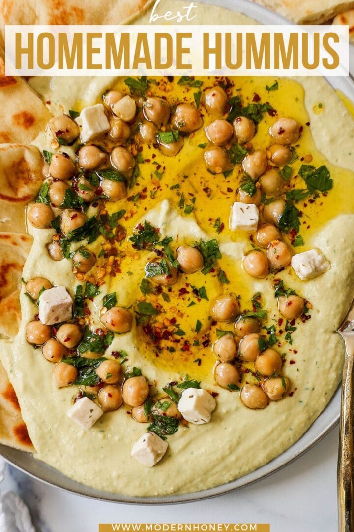 How to make authentic, creamy, homemade hummus made from scratch using simple ingredients -- chickpeas, tahini, garlic, olive oil, lemon juice, and salt. This is such an easy hummus recipe that everyone will love! 