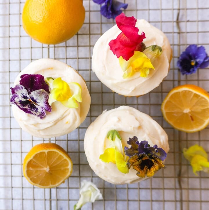 Light, fluffy homemade lemon cupcakes with fresh lemon frosting are the perfect dessert for lemon lovers. This is the best lemon cupcake recipe!