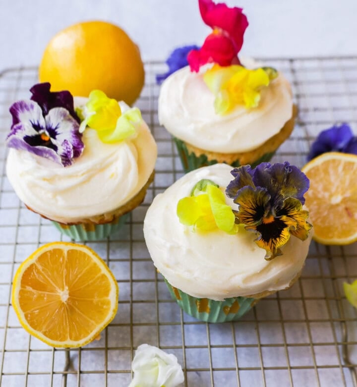 Light, fluffy homemade lemon cupcakes with fresh lemon frosting are the perfect dessert for lemon lovers. This is the best lemon cupcake recipe!