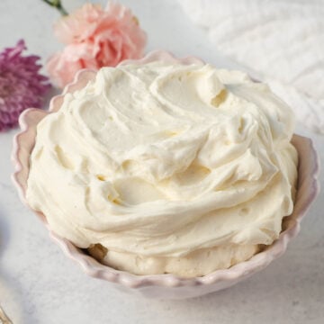 Creamy mascarpone cream is the most delicious and luxurious cake filling, dessert filling, or the perfect spread on any dessert. This Mascarpone Frosting is made with heavy cream, mascarpone cheese, powdered sugar, and vanilla or almond extract.
