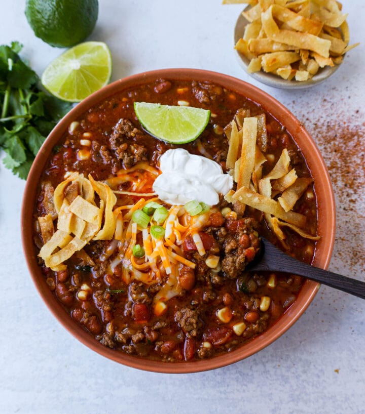 Quick and Easy 30-minute Taco Soup Recipe has all of the flavors of tacos made into a soup! 