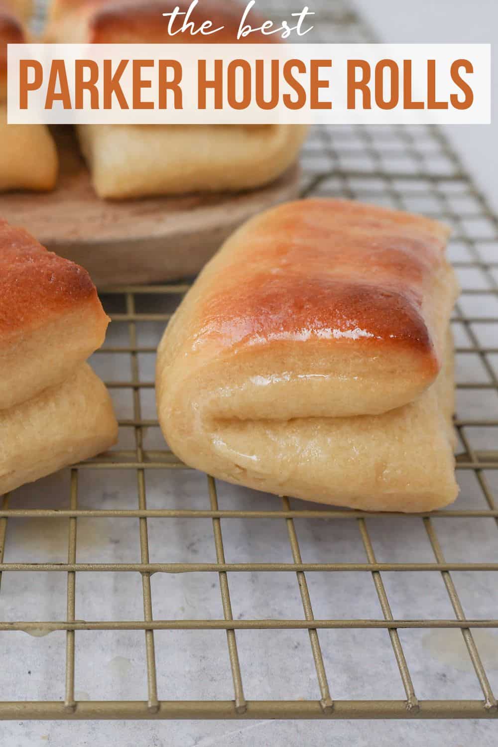 The Famous Parker House Rolls are light, fluffy, and buttery with a secret ingredient that make them tender and melt in your mouth. This the best parker house roll recipe!