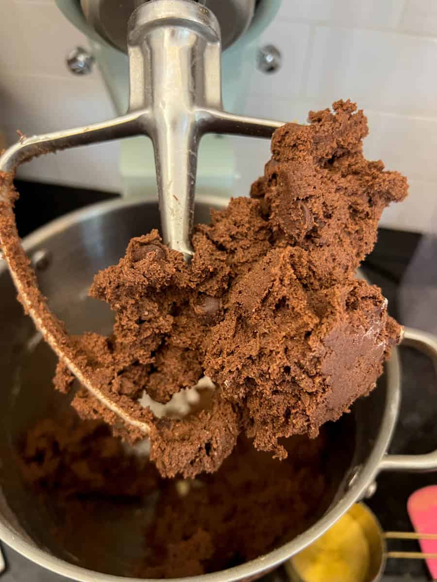 Mixing the double chocolate chip cookie dough in a stand mixer. 