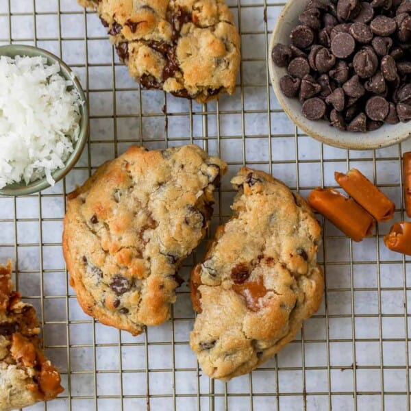 Soft, chewy thick Levain Bakery Caramel Coconut Cookies made with rich caramel, sweet coconut flakes, and semisweet chocolate chips. This seasonal Levain Bakery cookie recipe is the perfect coconut caramel cookie.
