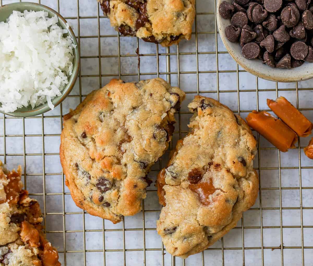 Soft, chewy thick Levain Bakery Caramel Coconut Cookies made with rich caramel, sweet coconut flakes, and semisweet chocolate chips. This seasonal Levain Bakery cookie recipe is the perfect coconut caramel cookie.