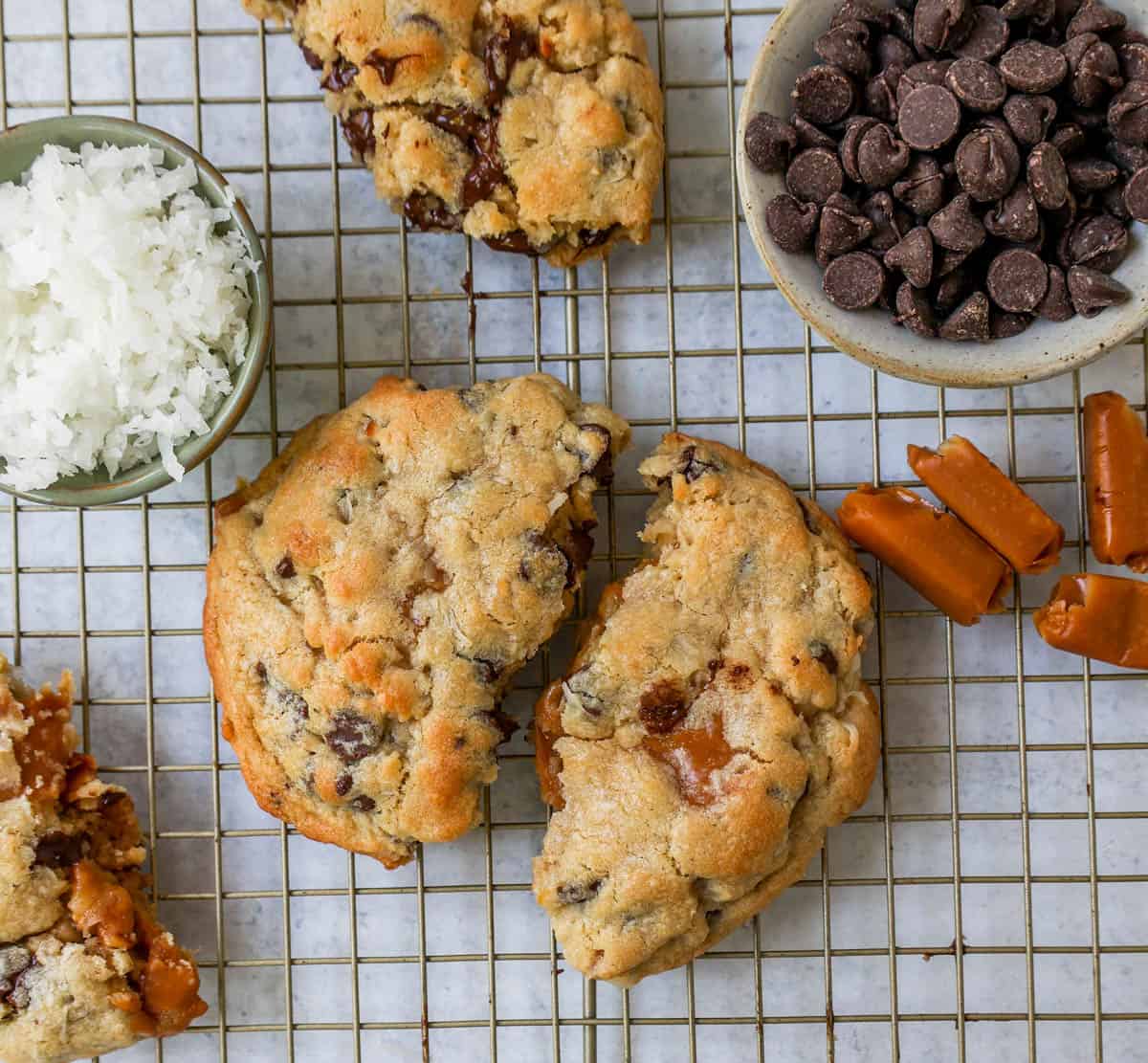 Soft, chewy thick Levain Bakery Caramel Coconut Cookies made with rich caramel, sweet coconut flakes, and semisweet chocolate chips. This seasonal Levain Bakery cookie recipe is the perfect coconut caramel cookie.