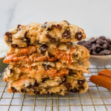 Soft, chewy thick Levain Bakery Caramel Coconut Cookies made with rich caramel, sweet coconut flakes, and semisweet chocolate chips. This seasonal Levain Bakery cookie recipe is the perfect coconut caramel cookie.