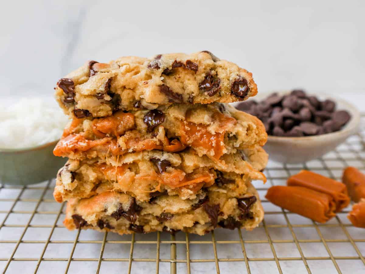 Soft, chewy thick Levain Bakery Caramel Coconut Cookies made with rich caramel, sweet coconut flakes, and semisweet chocolate chips. This seasonal Levain Bakery cookie recipe is the perfect coconut caramel cookie.